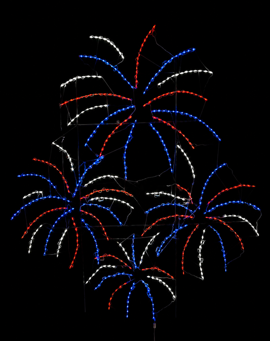 Patriotic light display featuring four bursting firework shapes in red, white, and blue